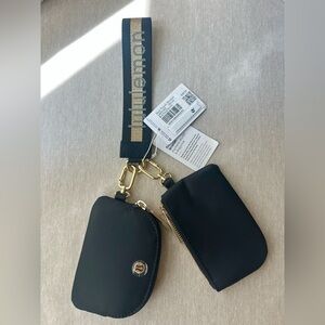 Lululemon Dual Pouch Wristlet Black and Gold Wristlet Duo
